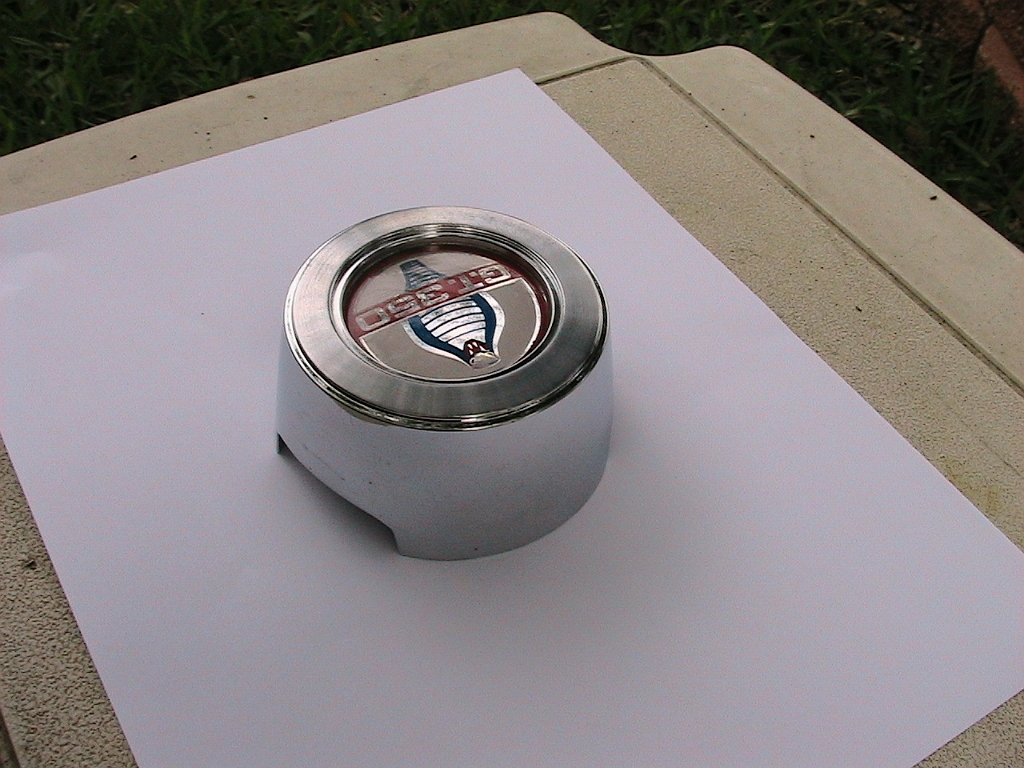 Carryover Home/Carryover Cars/Parts Closeups/Steering Wheel Center Cap